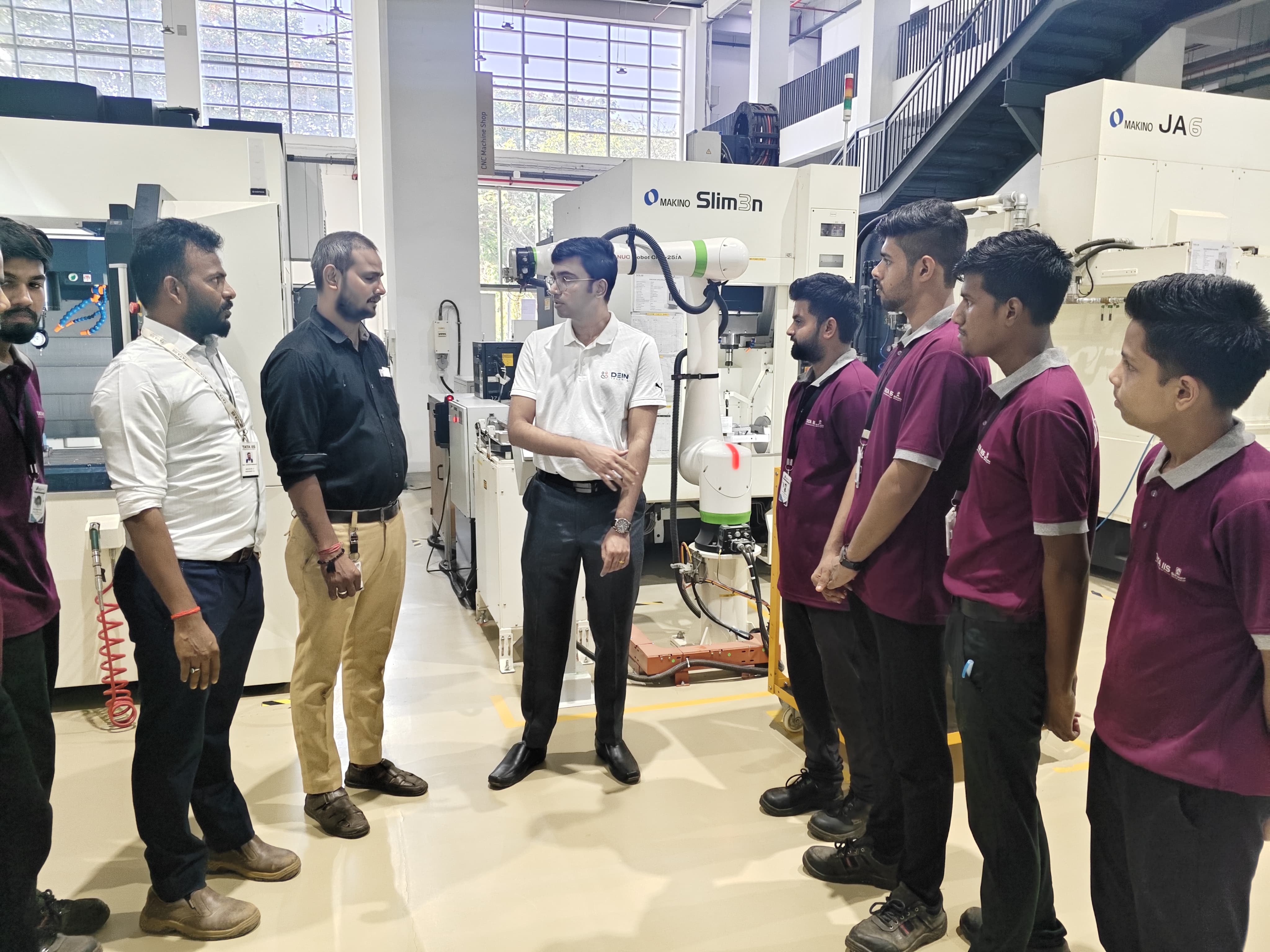 DEIN Talents discussing industrial training with Tata IIS trainees